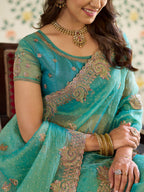 Aqua Green Fendy Satin Embroidered Saree with Paisley Motifs & Zari Border | Designer Festive Saree with Tassels & Heavy Embroidered Blouse