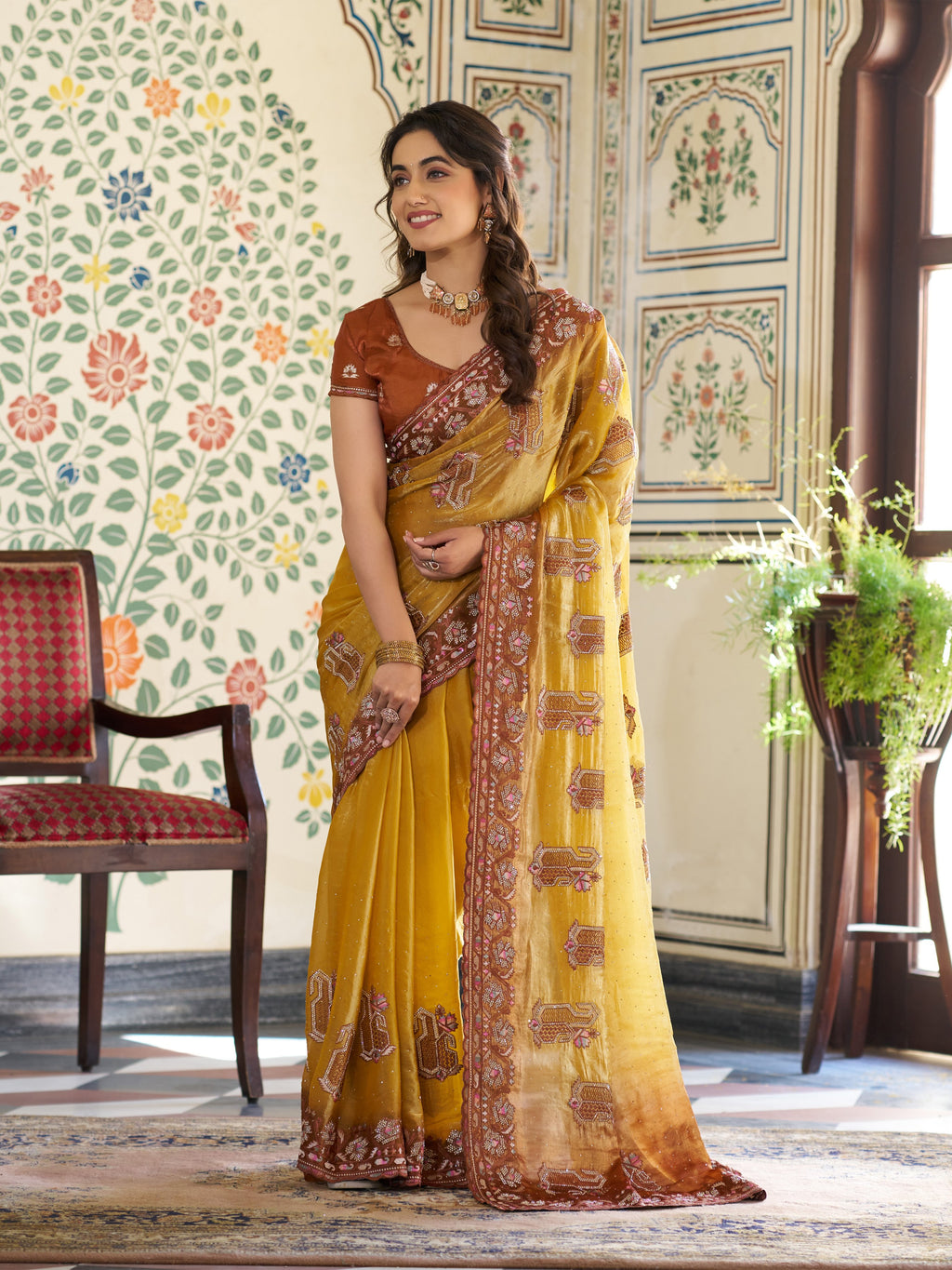 Mustard Yellow Fendy Satin Embroidered Saree with Ethnic Elephant Motifs & Contrast Zari Border | Designer Saree with Tassels & Heavy Embroidered Blouse