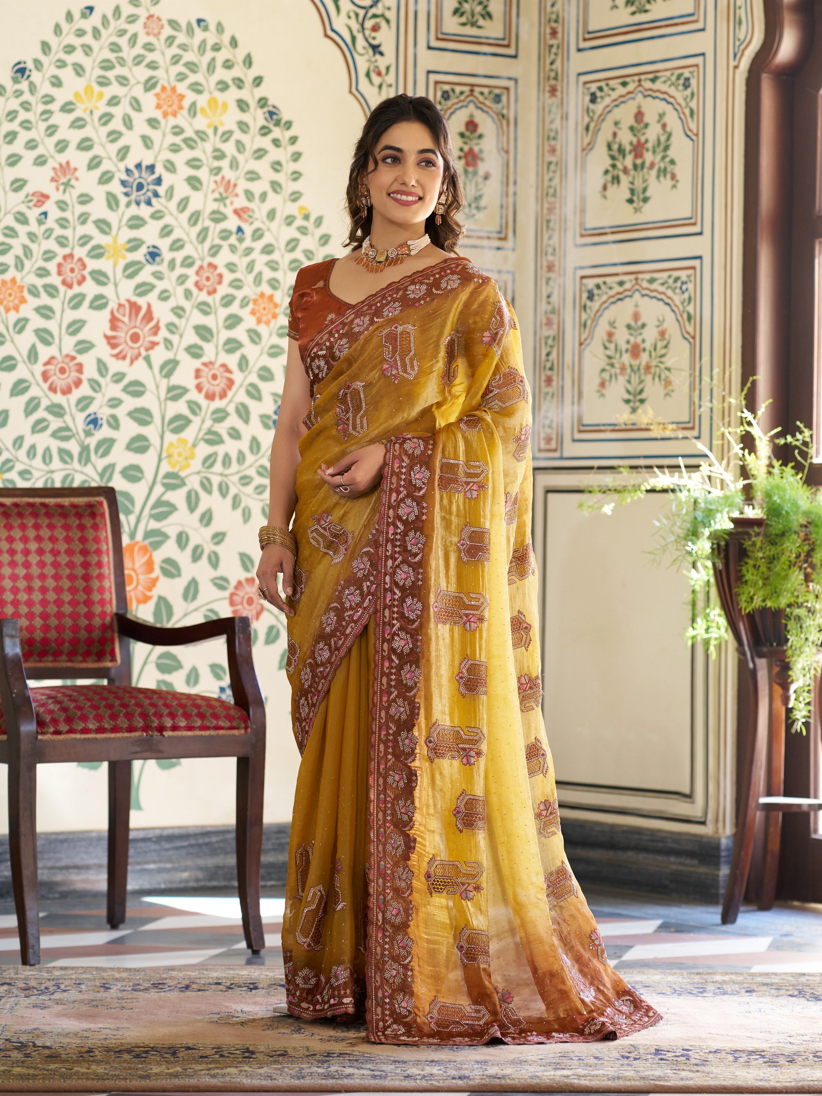 Mustard Yellow Fendy Satin Embroidered Saree with Ethnic Elephant Motifs & Contrast Zari Border | Designer Saree with Tassels & Heavy Embroidered Blouse