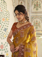Mustard Yellow Fendy Satin Embroidered Saree with Ethnic Elephant Motifs & Contrast Zari Border | Designer Saree with Tassels & Heavy Embroidered Blouse