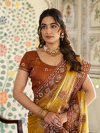 Mustard Yellow Fendy Satin Embroidered Saree with Ethnic Elephant Motifs & Contrast Zari Border | Designer Saree with Tassels & Heavy Embroidered Blouse
