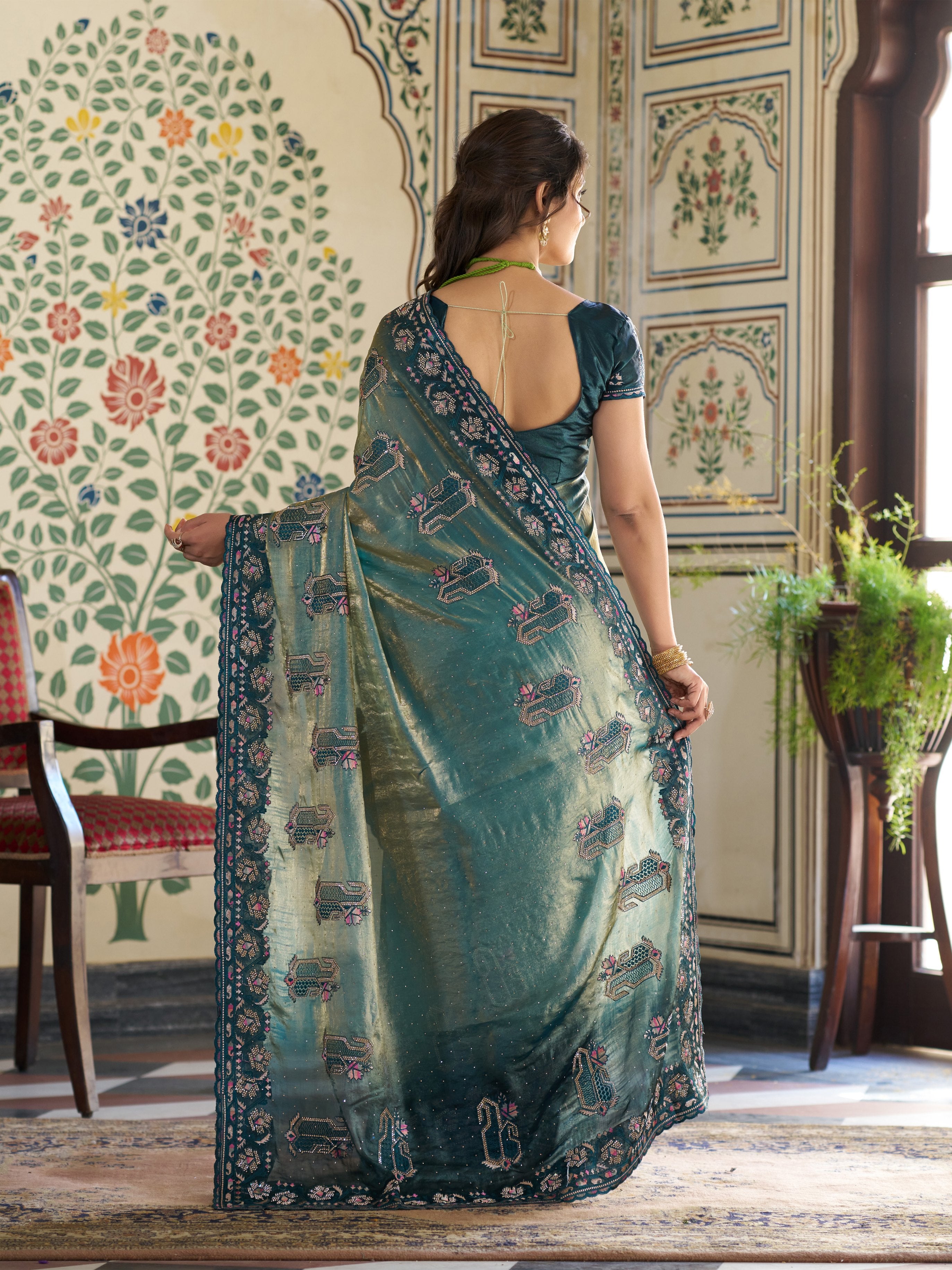 Teal Blue Fendy Satin Embroidered Saree with Ethnic Elephant Motifs & Zari Border | Designer Saree with Tassels & Heavy Embroidered Blouse